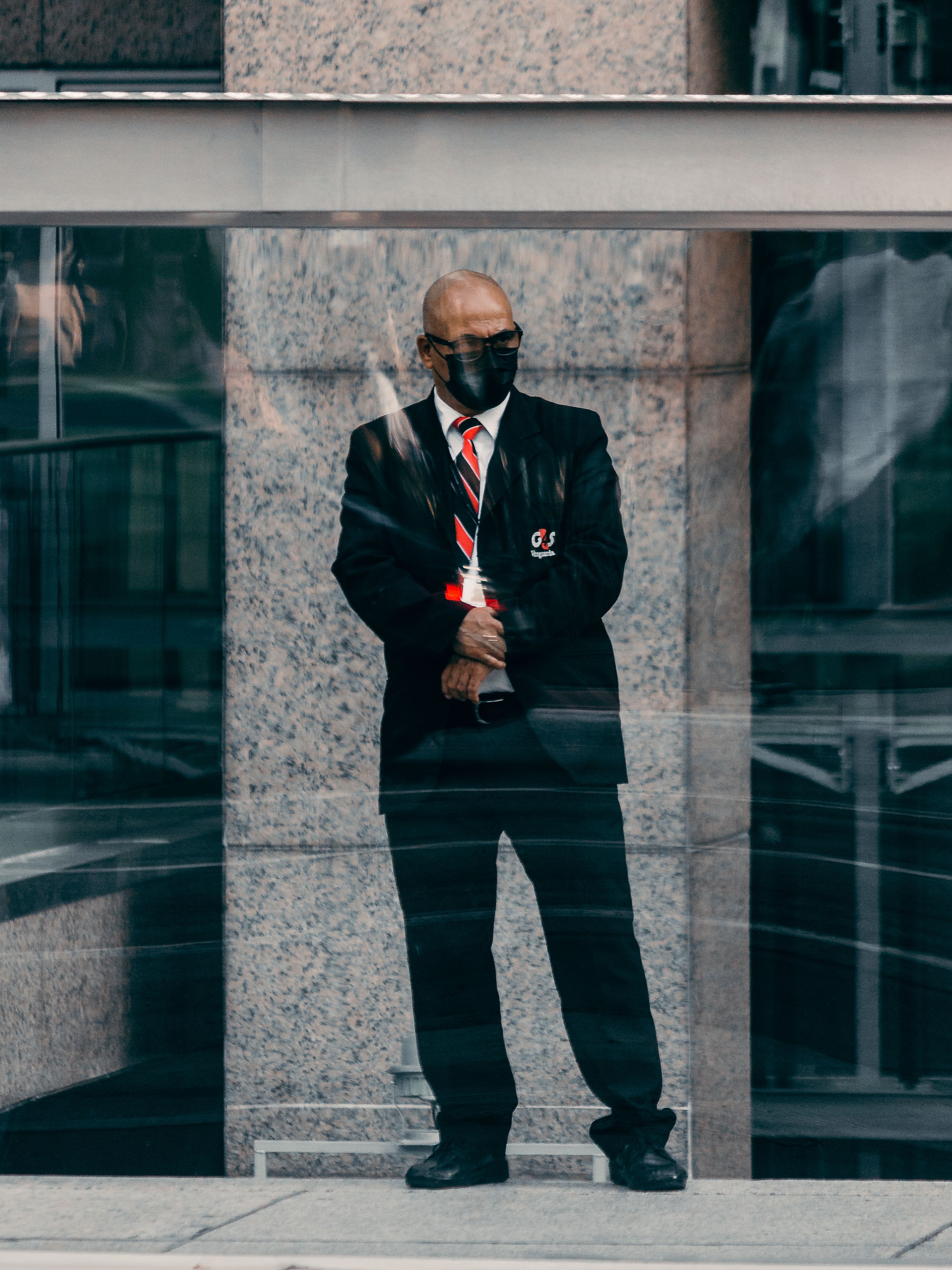 Security professional monitoring a controlled-access property